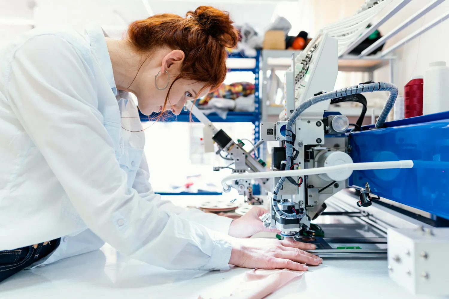 Apparel production line with garments on conveyor
